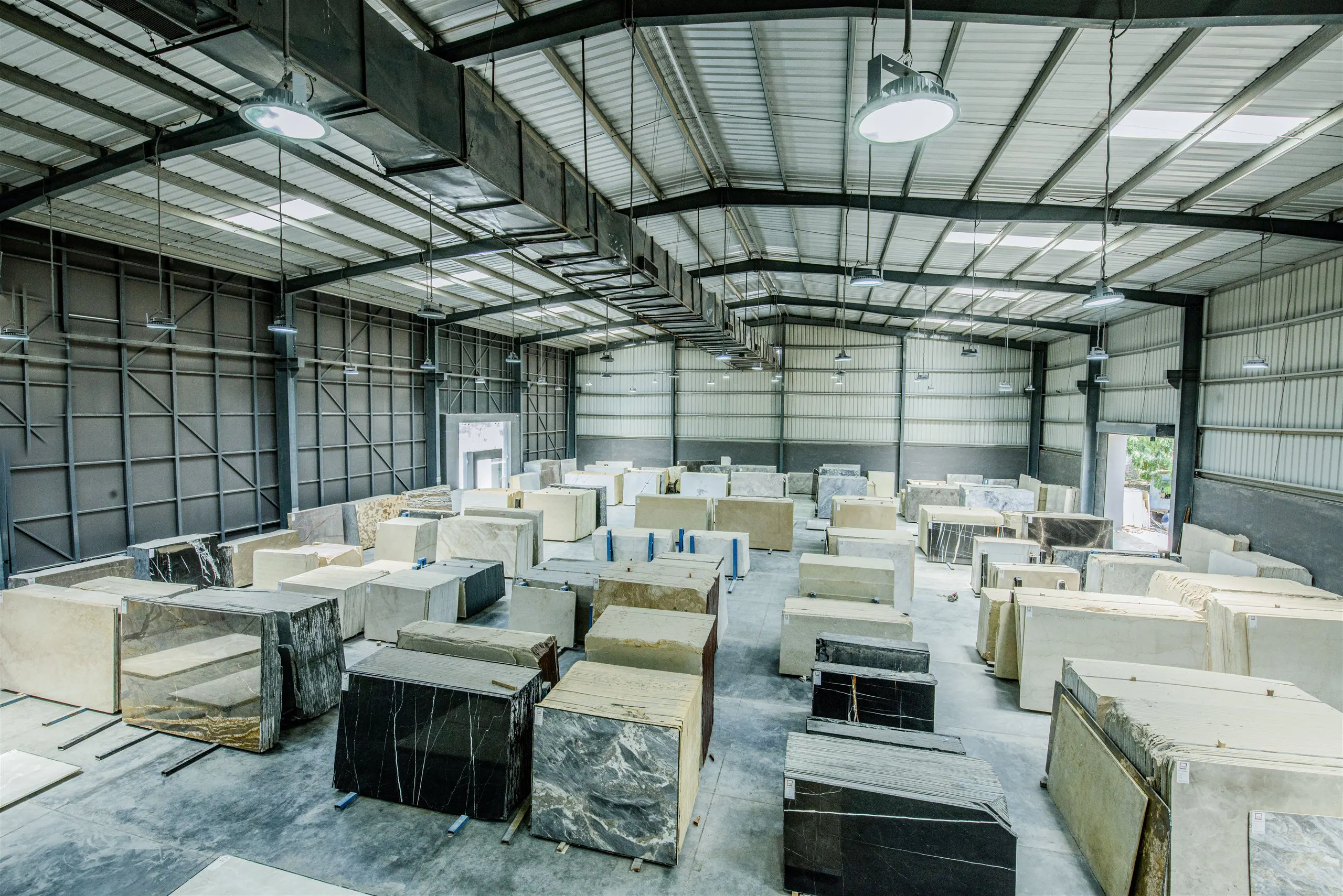 The slab warehouse — natural stone blocks, stacked